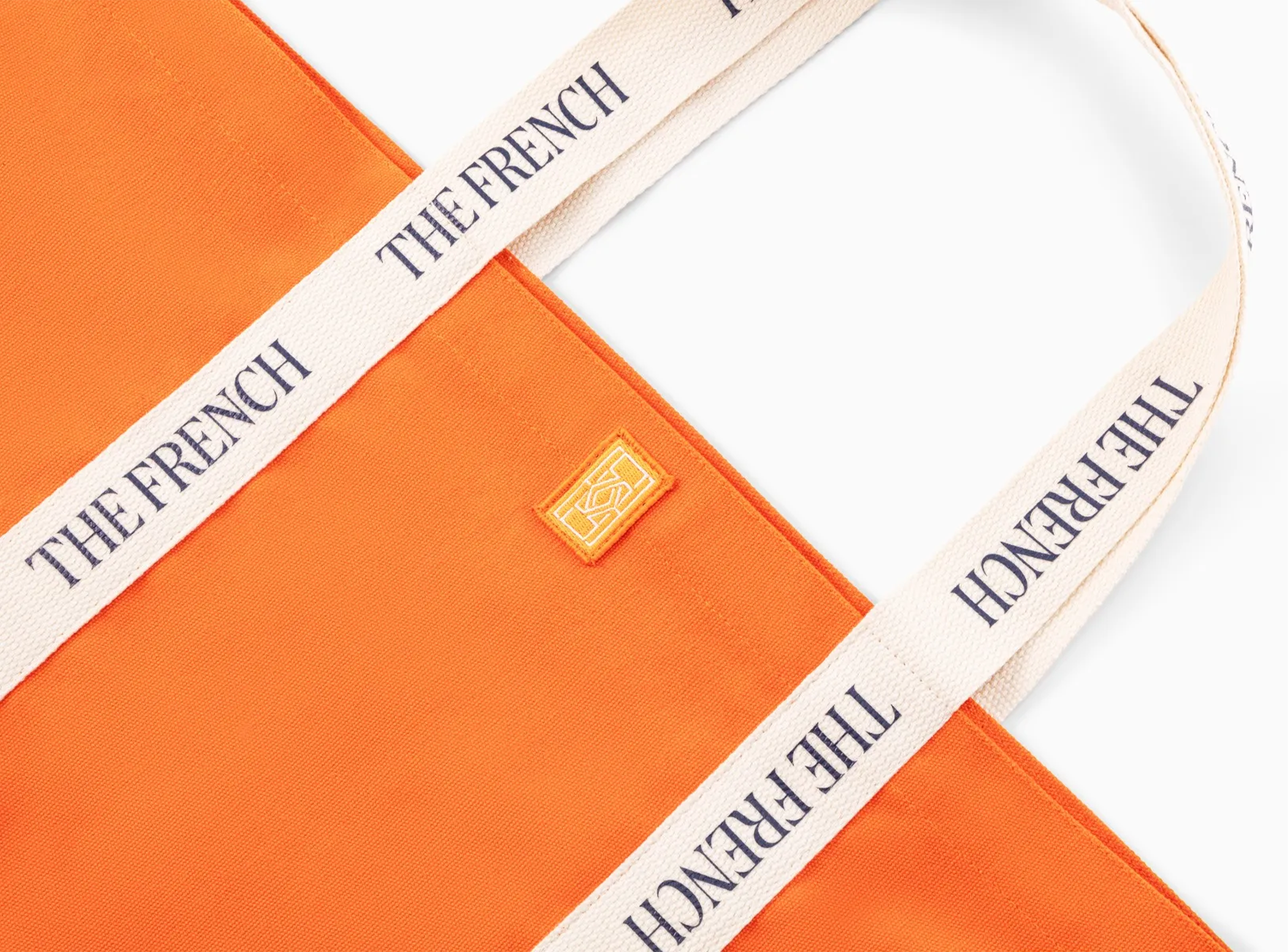 르노 테니스 2025 더 프렌치 코튼 캔버스 토트백 오렌지